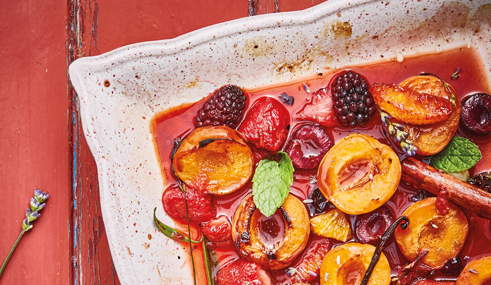 Spiced Apricots and Summer Berries served in a dish and topped with mint leaves